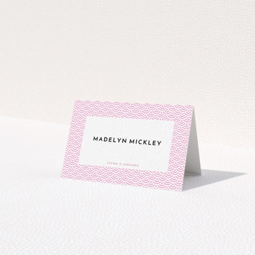 A table place card called 'Pink Fans'. It is an 85 x 55mm card in a landscape orientation. 'Pink Fans' is available as a folded card, with tones of pink and white.