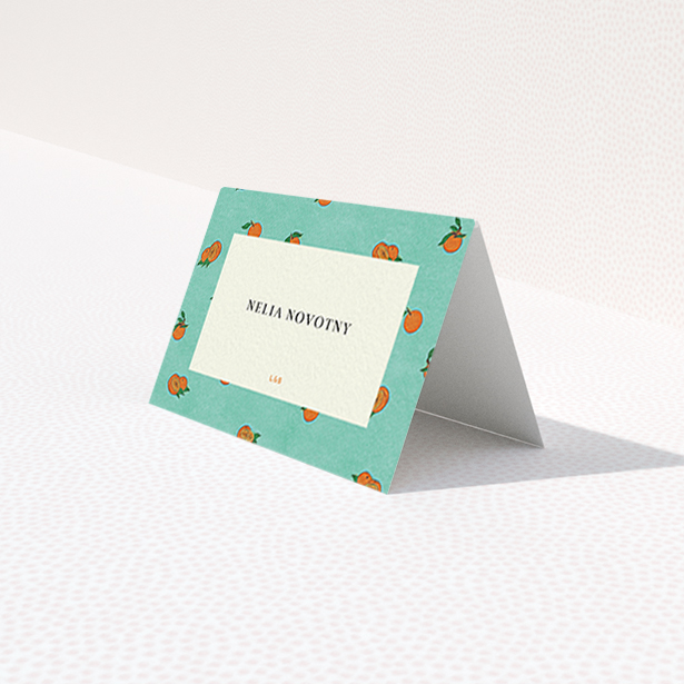 A table place card design called "Seville". It is an 85 x 55mm card in a landscape orientation. "Seville" is available as a folded card, with tones of green and orange.