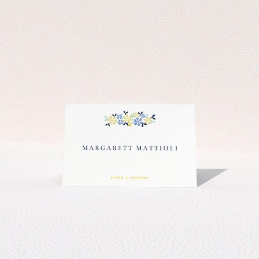 Table Place Card Design - "Simplistic Bouquet" A table place card template titled "Simplistic Bouquet". It is an 85 x 55mm card in a landscape orientation. "Simplistic Bouquet" is available as a folded card, with tones of white and blue.