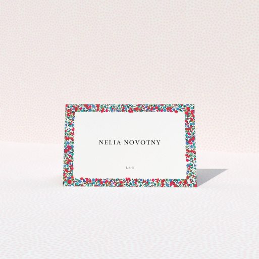 Table Place Card Design - "Summer from a distance" A table place card design titled "Summer from a distance". It is an 85 x 55mm card in a landscape orientation. "Summer from a distance" is available as a folded card, with tones of red, blue and green.