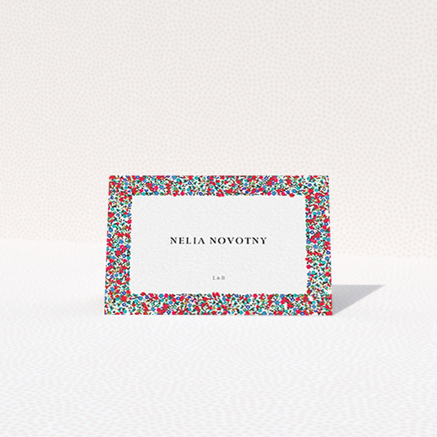 A table place card design titled "Summer from a distance". It is an 85 x 55mm card in a landscape orientation. "Summer from a distance" is available as a folded card, with tones of red, blue and green.
