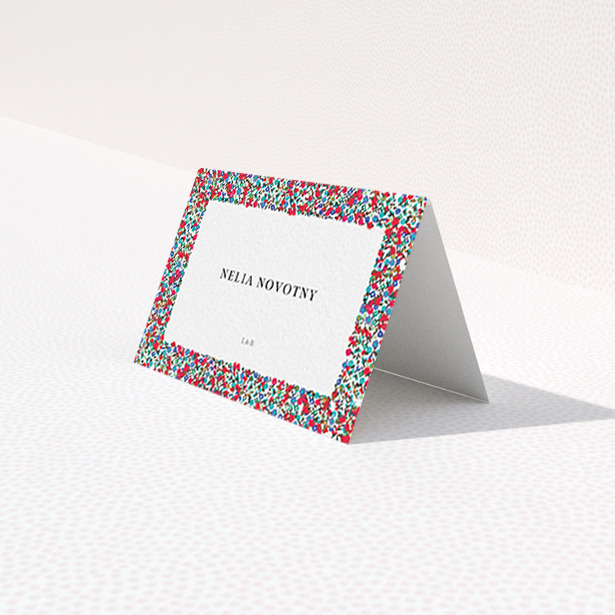 A table place card design titled "Summer from a distance". It is an 85 x 55mm card in a landscape orientation. "Summer from a distance" is available as a folded card, with tones of red, blue and green.