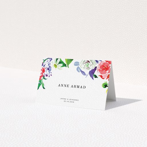 A table place card design called 'The flowerbed'. It is an 85 x 55mm card in a landscape orientation. 'The flowerbed' is available as a folded card, with tones of white and green.