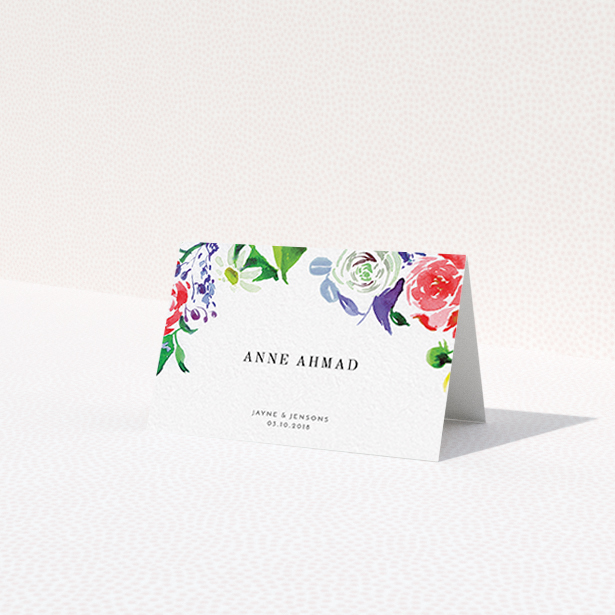 A table place card design called "The flowerbed". It is an 85 x 55mm card in a landscape orientation. "The flowerbed" is available as a folded card, with tones of white and green.