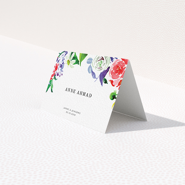 A table place card design called "The flowerbed". It is an 85 x 55mm card in a landscape orientation. "The flowerbed" is available as a folded card, with tones of white and green.