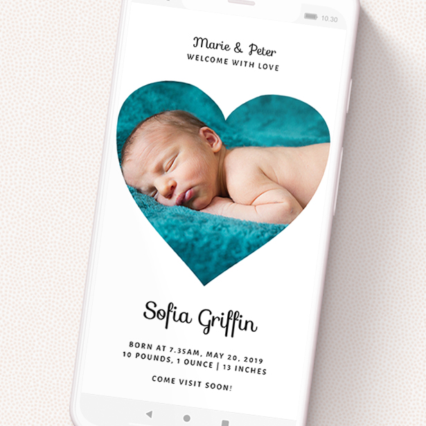 A text message birth announcement called 'Simple Heart Frame'. It is a smartphone screen sized announcement in a portrait orientation. It is a photographic text message birth announcement with room for 1 photo. 'Simple Heart Frame' is available as a flat announcement, with mainly white colouring.