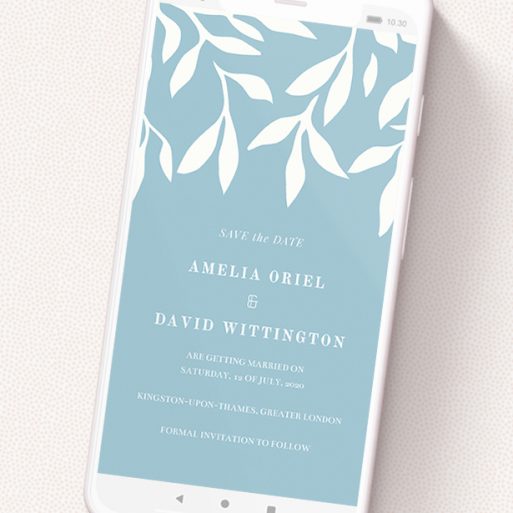 A text message save the date design named 'Winter bloom '. It is a smartphone screen sized save the date in a portrait orientation. 'Winter bloom ' is available as a flat save the date, with tones of blue and white.