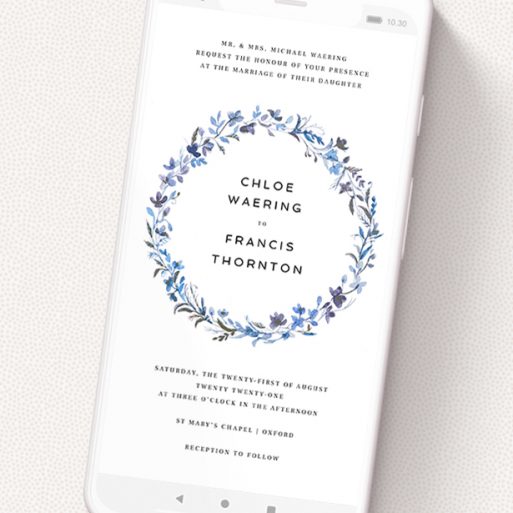A text message wedding invite design named 'Blue Floral Wreath'. It is a smartphone screen sized invite in a portrait orientation. 'Blue Floral Wreath' is available as a flat invite, with tones of light blue, purple and grey.