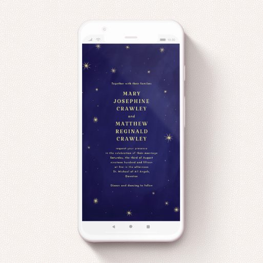 A text message wedding invite called "Sky at night ". It is a smartphone screen sized invite in a portrait orientation. "Sky at night " is available as a flat invite, with tones of blue and gold.
