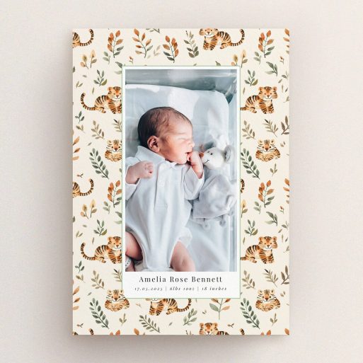Birth announcement card featuring floral and tiger design with one baby photo.
