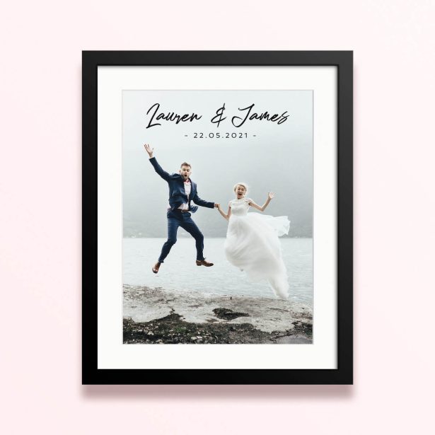 Framed and mounted photo print featuring one photo of a joyful couple on their wedding day.