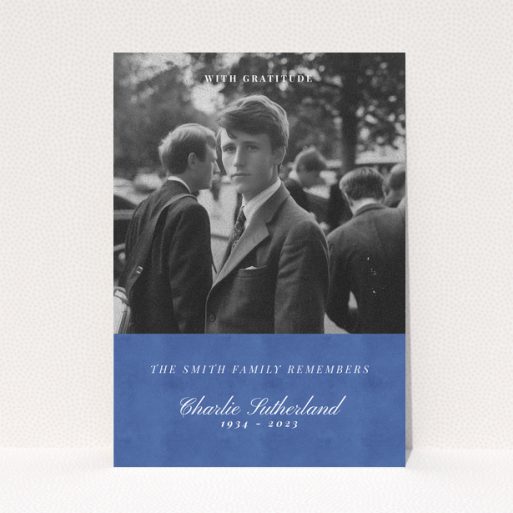 Funeral thank you card with black and white photo of a person in formal attire.