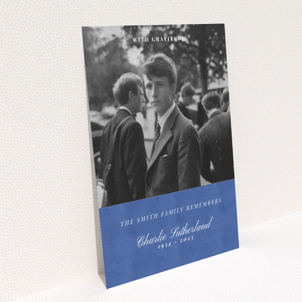 Funeral thank you card with black and white photo of a person in formal attire.