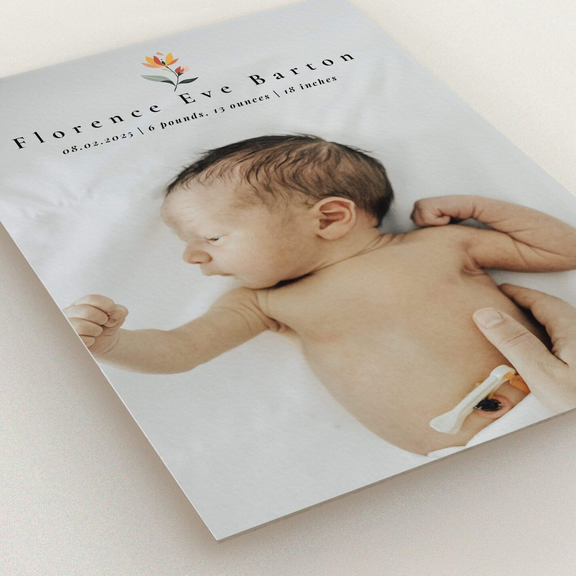 Minimalist birth announcement card design featuring one photo of a newborn baby.