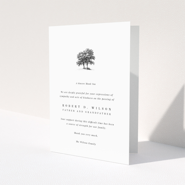 Funeral thank you card with a tree illustration and one photo.