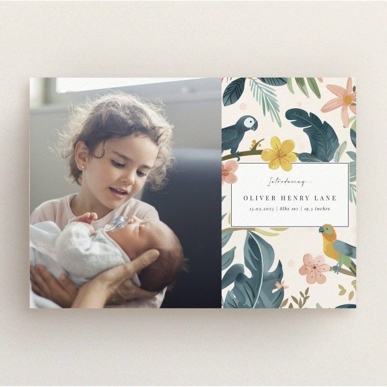 Floral illustrated birth announcement card design with one photo of a child holding a baby.