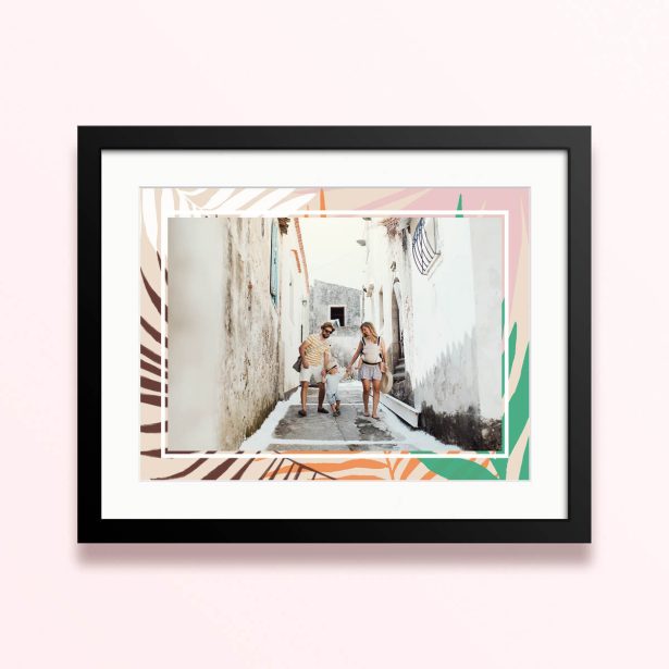 Framed and mounted photo print with one photo of a family walking through a quaint street