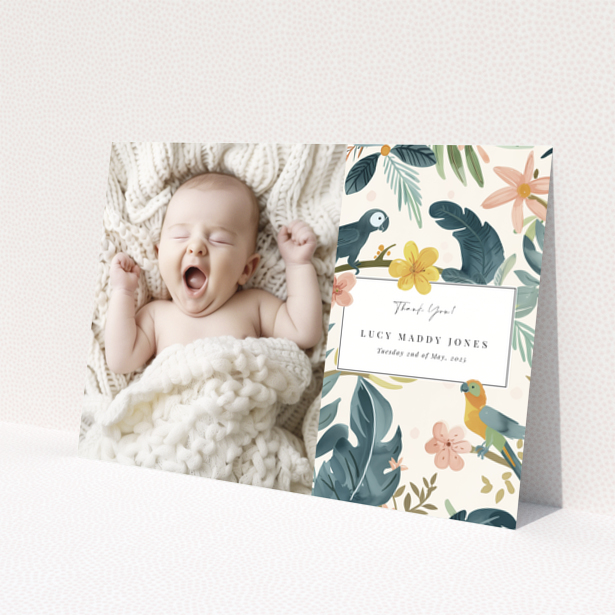 Baby thank you card with one photo of a baby on the left and floral design on the right