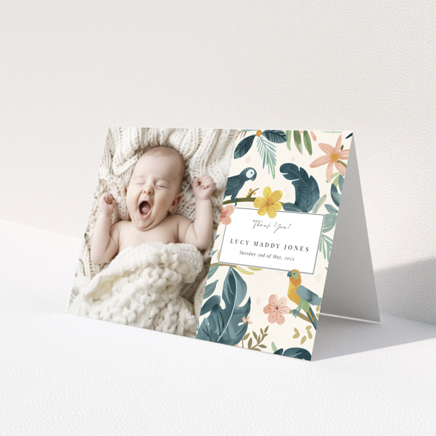 Baby thank you card with one photo of a baby on the left and floral design on the right