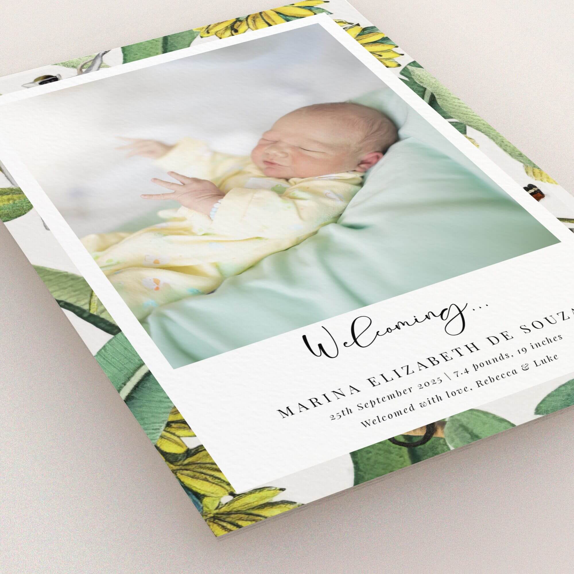 Floral-themed birth announcement card design featuring one photo of a newborn baby.