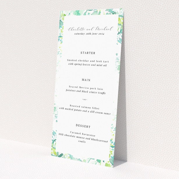 'Dappled wedding menu template with lush foliage borders creating a sunlit grove effect, perfect for infusing celebration with tranquil beauty.'. This is a view of the front