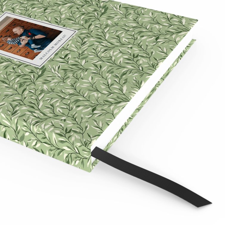 Floral patterned notebook cover design with one photo on the front.