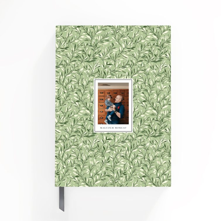 Floral patterned notebook cover design with one photo on the front.