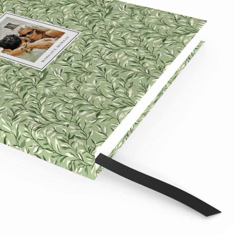 Leaf-patterned portrait notebook design with one photo on the front cover by Utterly Printable.