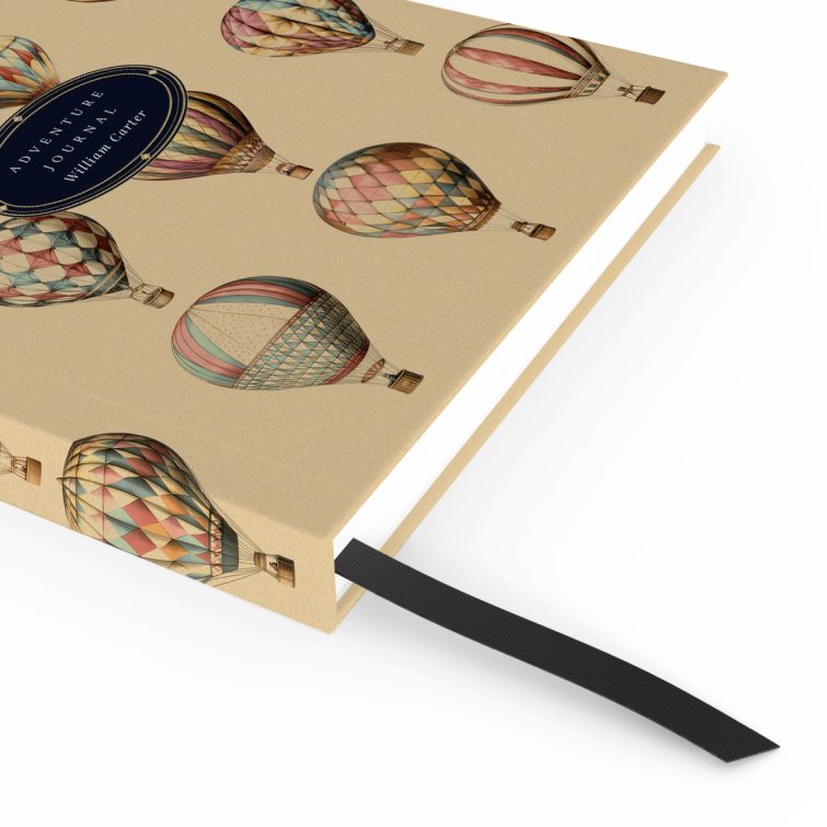 Vintage hot air balloon design for personalised notebooks with 24 illustrations, ideal for bespoke gifts.