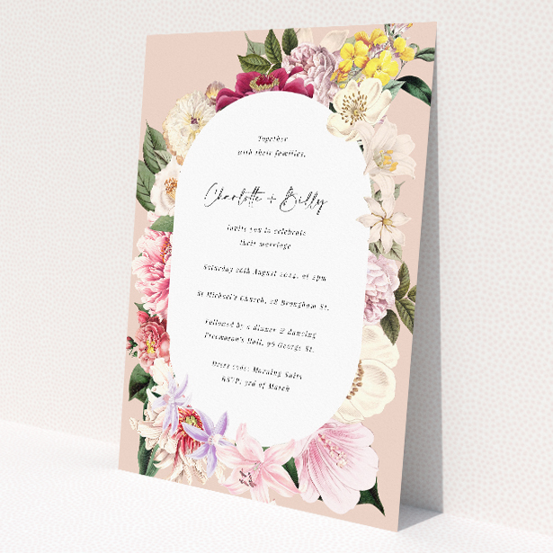 A5 wedding invitation featuring a vintage charm design with antique-styled flowers forming a lush frame around an oval-shaped, ivory-textured centre, in soft blush pinks, creamy whites, and muted yellows, ideal for couples seeking timeless elegance with a contemporary twist This is a view of the front