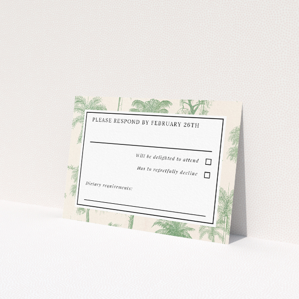 RSVP card from the 'Vintage Engravings' suite, featuring a soft green palm motif and dark typography against white space, inspired by classic botanical engravings, perfect for vintage-loving couples setting the tone for an elegant and romantic wedding This is a view of the front