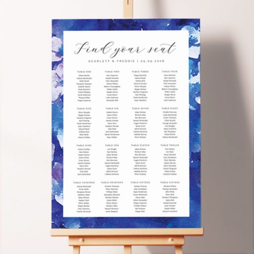 Personalized Violets Foamex Seating Plan with enchanting blue and purple watercolour floral petals. This template shows 16 tables.