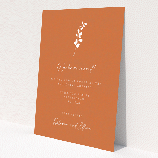 Change of address card with orange background and white floral illustration