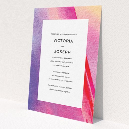 A wedding invite card design called 'Abstract Pink Watercolour'. It is an A5 invite in a portrait orientation. 'Abstract Pink Watercolour' is available as a flat invite, with tones of vibrant pink, purple and red.