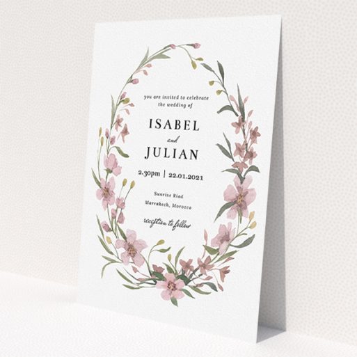 A wedding invite card design named 'Autumn Floral Wreath'. It is an A5 invite in a portrait orientation. 'Autumn Floral Wreath' is available as a flat invite, with tones of faded pink and autumnal green.
