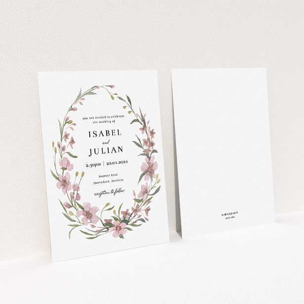 A wedding invite card design named "Autumn Floral Wreath". It is an A5 invite in a portrait orientation. "Autumn Floral Wreath" is available as a flat invite, with tones of faded pink and autumnal green.