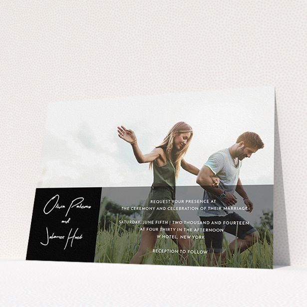 A wedding invite card called "Black on black". It is an A5 invite in a landscape orientation. It is a photographic wedding invite card with room for 1 photo. "Black on black" is available as a flat invite, with mainly black colouring.