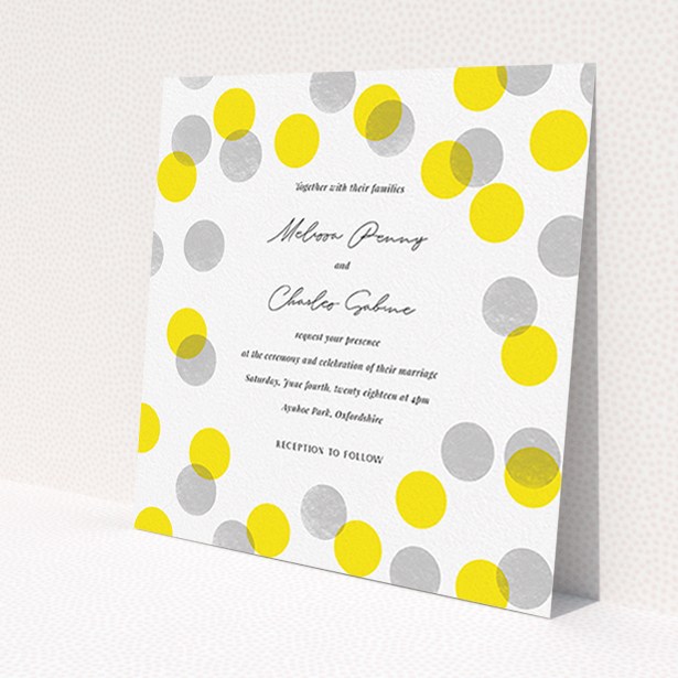 A wedding invite card design titled "Cork Stamps". It is a square (148mm x 148mm) invite in a square orientation. "Cork Stamps" is available as a flat invite, with tones of white and yellow.