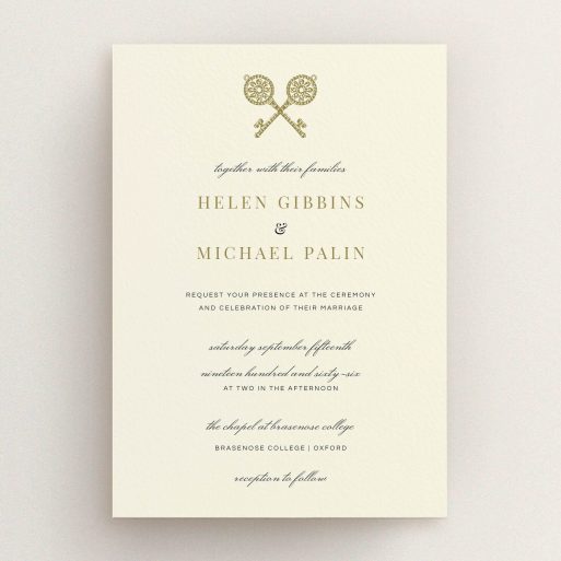 A wedding invite card named "Cross Keys". It is an A5 invite in a portrait orientation. "Cross Keys" is available as a flat invite, with tones of cream and gold.