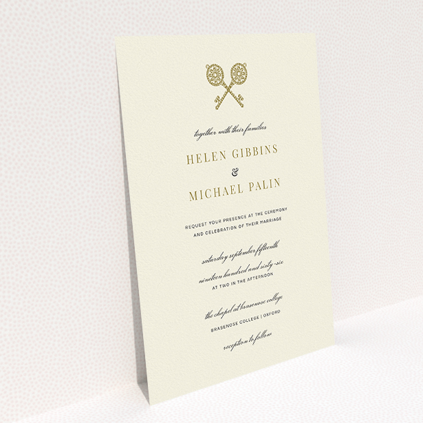 A wedding invite card named "Cross Keys". It is an A5 invite in a portrait orientation. "Cross Keys" is available as a flat invite, with tones of cream and gold.