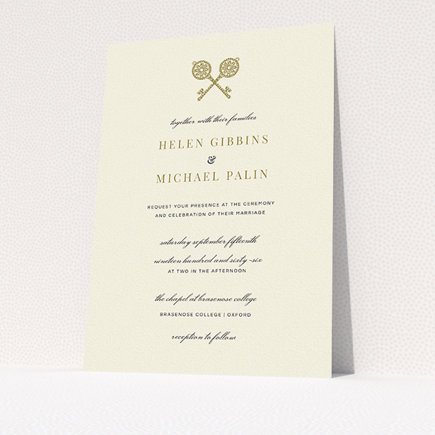 A wedding invite card named "Cross Keys". It is an A5 invite in a portrait orientation. "Cross Keys" is available as a flat invite, with tones of cream and gold.