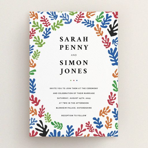 A wedding invite card called "Cut Out-esque". It is an A5 invite in a portrait orientation. "Cut Out-esque" is available as a flat invite, with tones of blue, red and green.