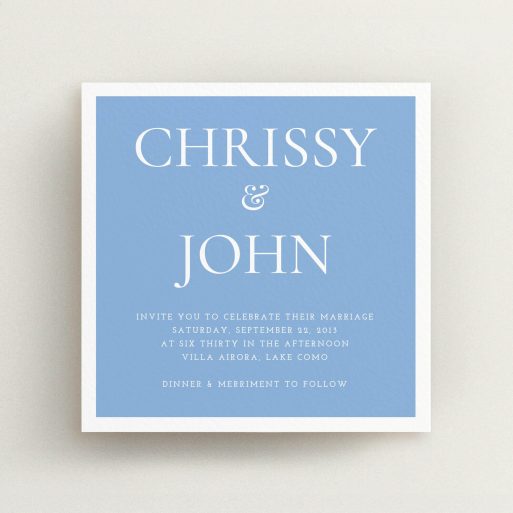 A wedding invite card named "Front and centre". It is a square (148mm x 148mm) invite in a square orientation. "Front and centre" is available as a flat invite, with tones of blue and white.