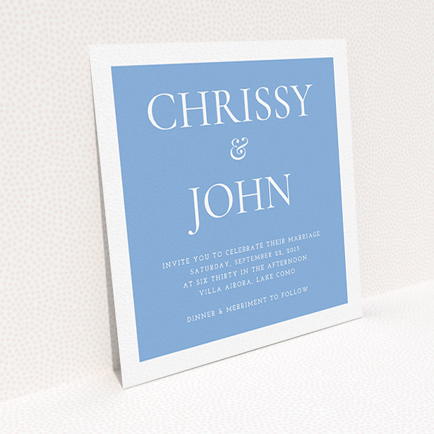 A wedding invite card named "Front and centre". It is a square (148mm x 148mm) invite in a square orientation. "Front and centre" is available as a flat invite, with tones of blue and white.