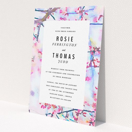 A wedding invite card design named 'Impression of Blossom'. It is an A5 invite in a portrait orientation. 'Impression of Blossom' is available as a flat invite, with tones of pink, blue and light purple.