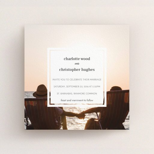 A wedding invite card named "In the suburbs". It is a square (148mm x 148mm) invite in a square orientation. It is a photographic wedding invite card with room for 1 photo. "In the suburbs" is available as a flat invite, with mainly white colouring.