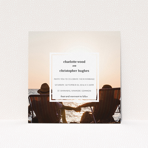 A wedding invite card named "In the suburbs". It is a square (148mm x 148mm) invite in a square orientation. It is a photographic wedding invite card with room for 1 photo. "In the suburbs" is available as a flat invite, with mainly white colouring.