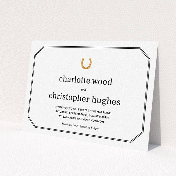 A wedding invite card named "Lucky horse shoe". It is an A5 invite in a landscape orientation. "Lucky horse shoe" is available as a flat invite, with tones of white, gold and black.
