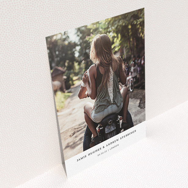 A wedding invite card named "Maddox Street". It is an A5 invite in a portrait orientation. It is a photographic wedding invite card with room for 1 photo. "Maddox Street" is available as a flat invite, with mainly white colouring.