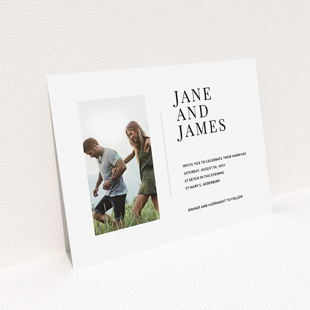 A wedding invite card template titled "Modern postcard". It is an A5 invite in a landscape orientation. It is a photographic wedding invite card with room for 1 photo. "Modern postcard" is available as a flat invite, with mainly white colouring.
